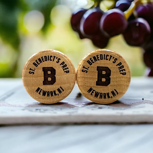 a couple of wooden buttons sitting on top of a table