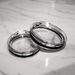 a couple of metal containers sitting on top of a white counter