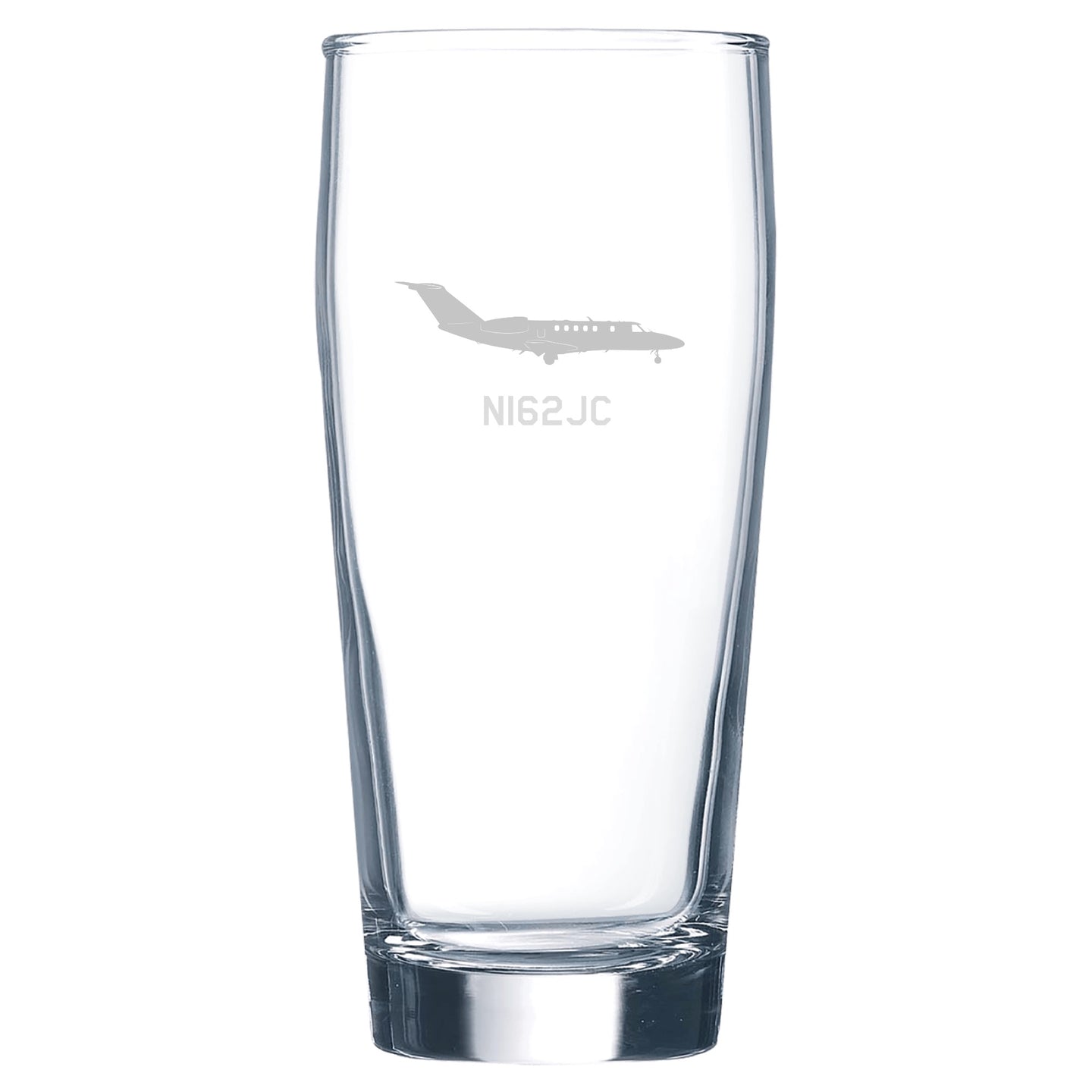 a glass with a plane etched on it