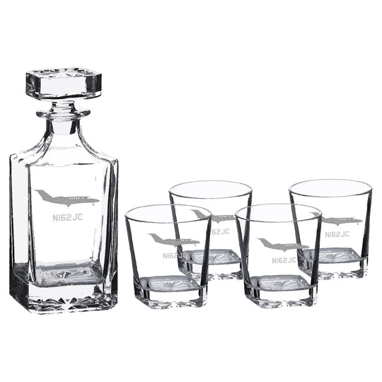 a set of three glasses and a decanter