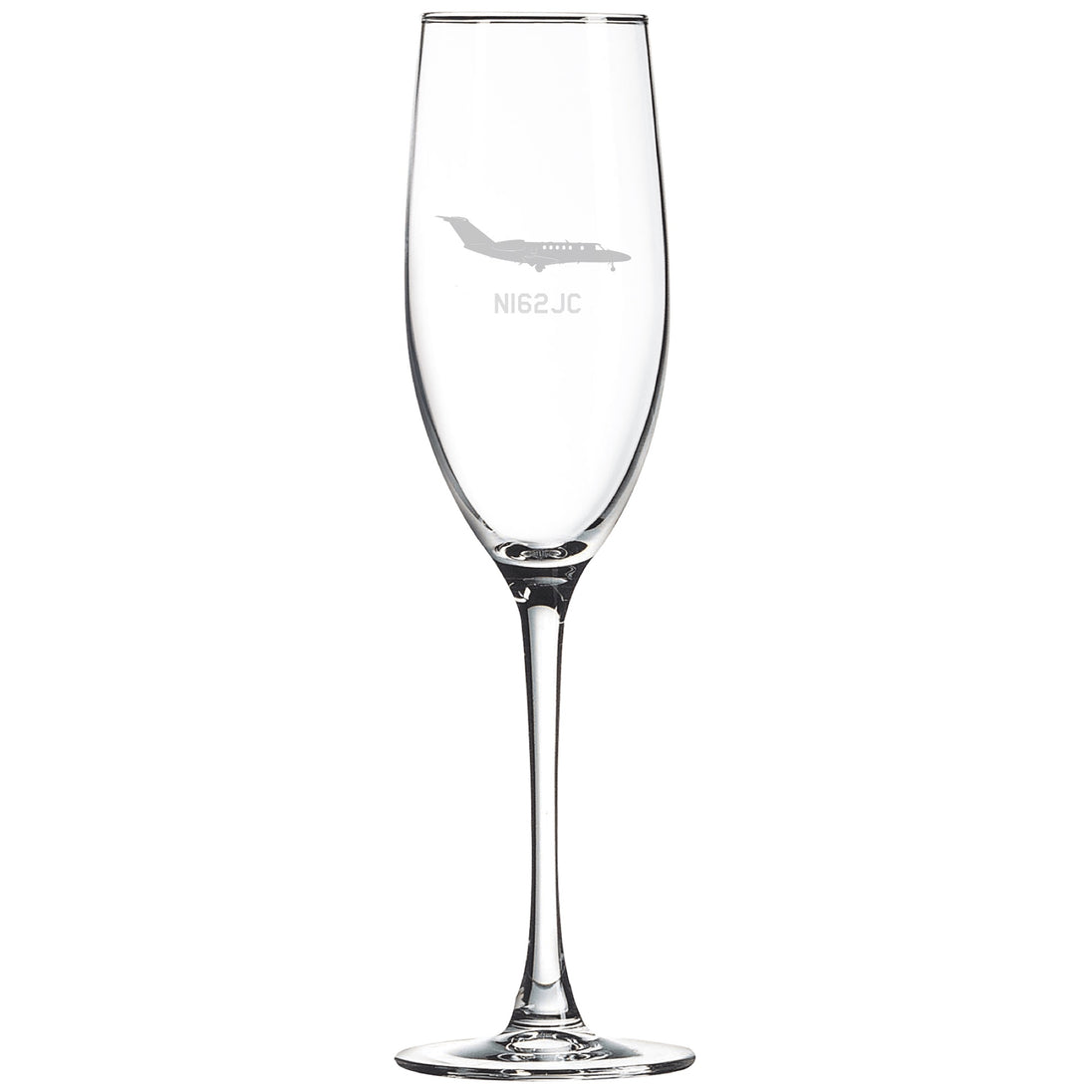 a wine glass with a bird etched on it